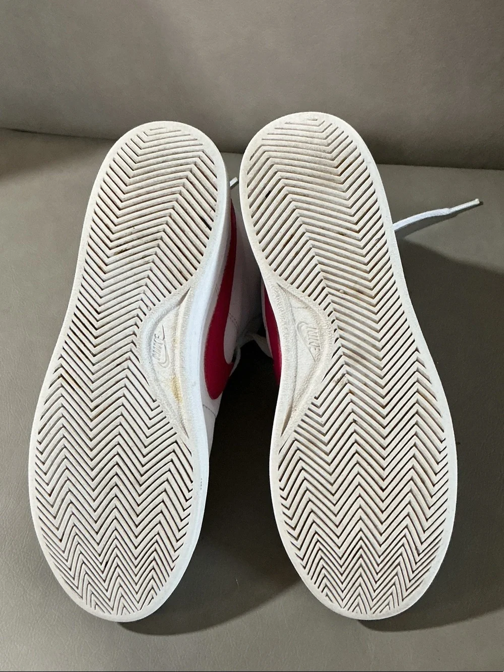 Nike Women's White Sneakers with Pink Swoosh High-Top